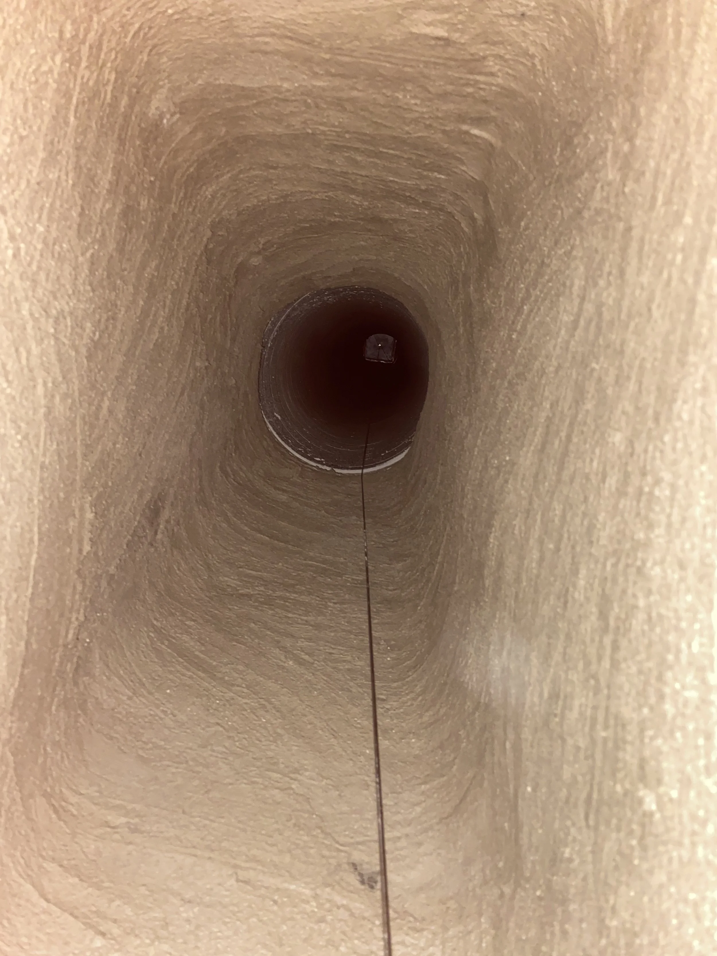 Smoke chamber parge coated smooth per code after new stainless steel insulated chimney liner was installed. Aslo a new lock top damper was installed.