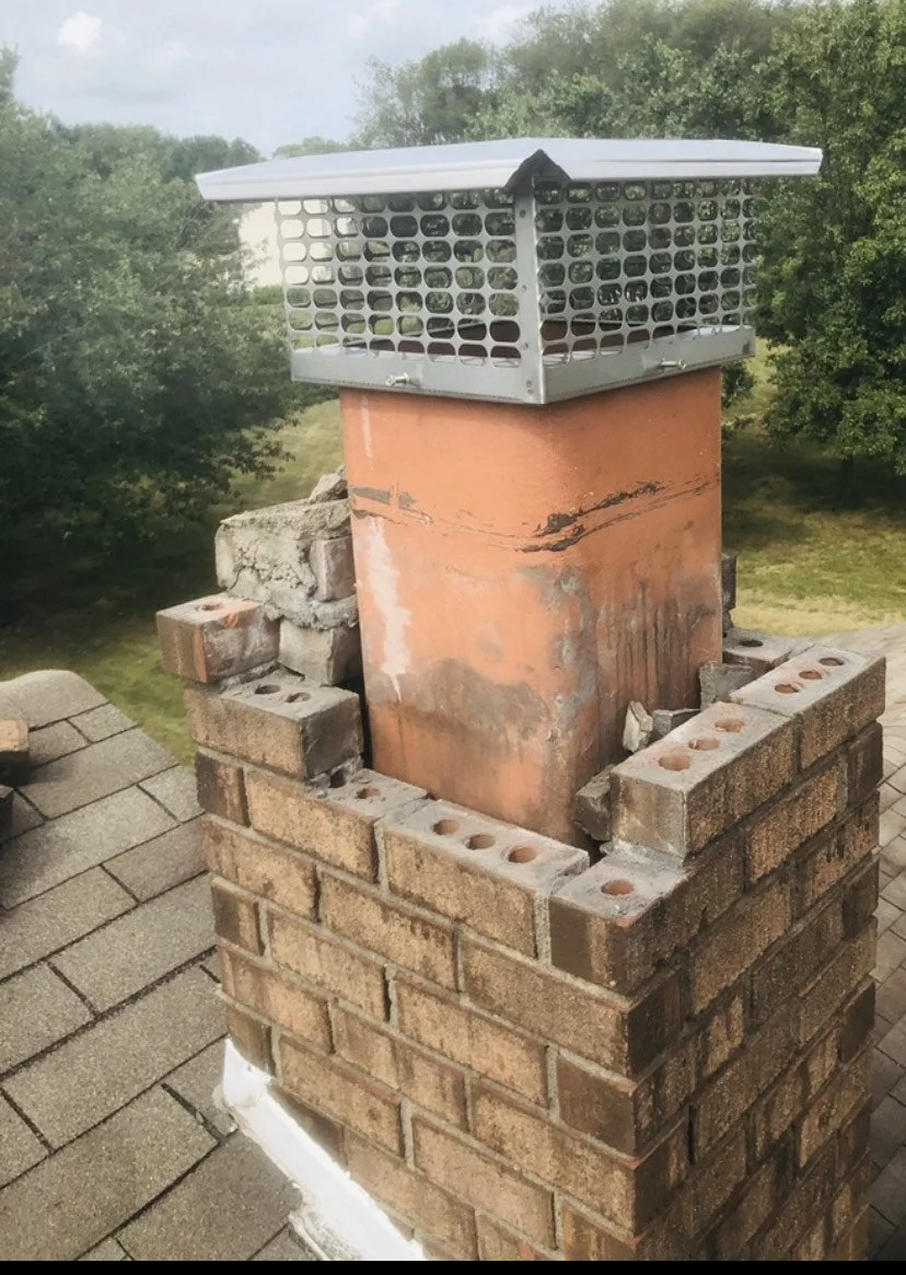 Masonry chimney was hit by a falling tree.