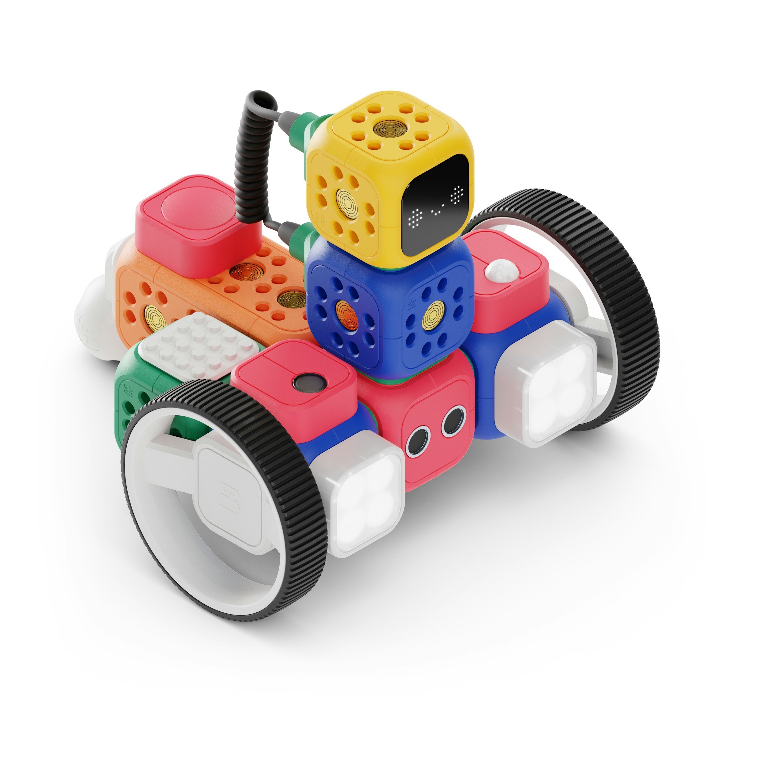 Colorful robotic toy with various geometric shapes and textured surfaces on a white background.