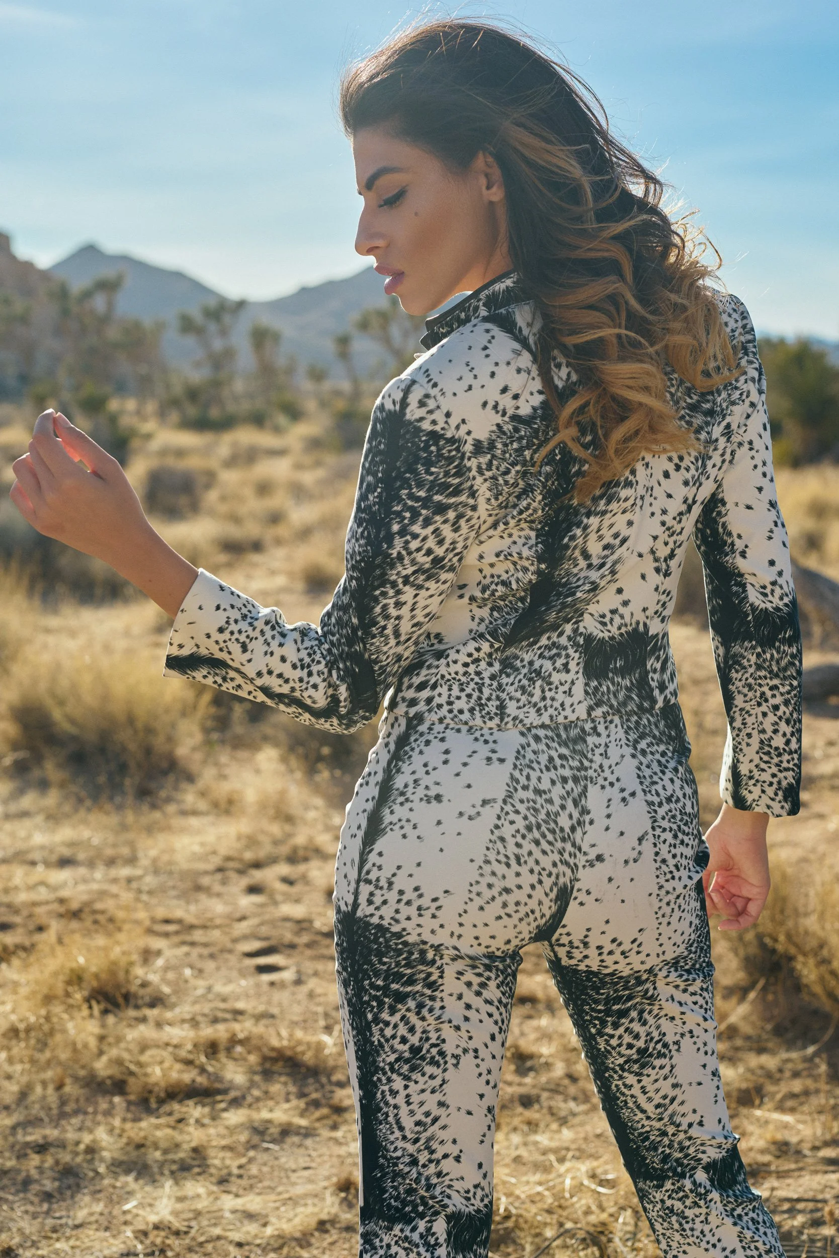 Vart wearing a graphic black-and-white suit photographed in the Joshua Tree desert
