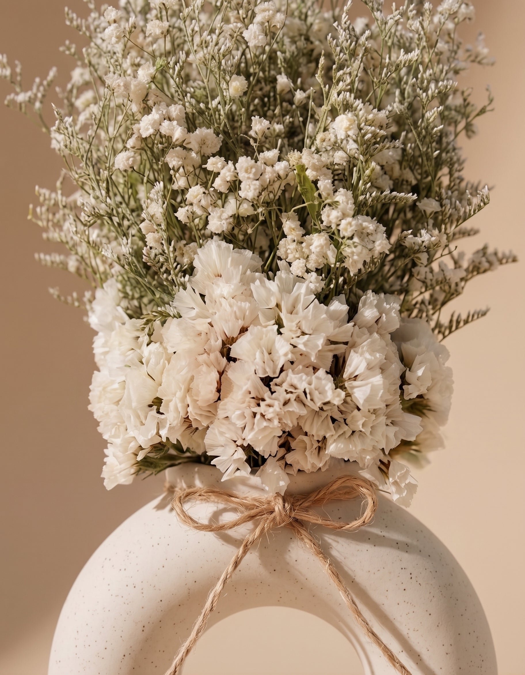 Minimalist_Natural_Flower_Arrangement_in_Stoneware_Halo_Vase_2.jpg
