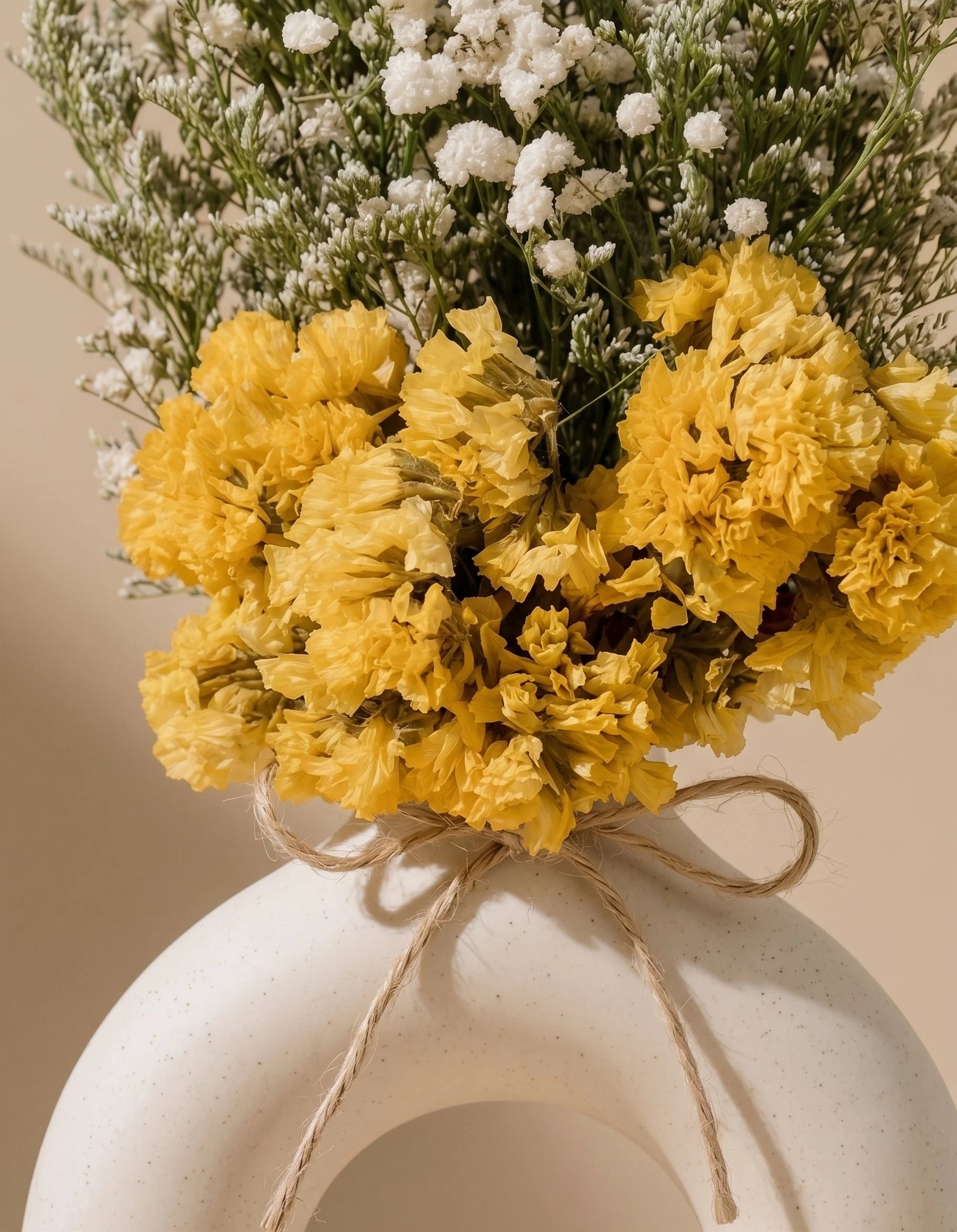 Minimalist_Yellow_and_White_Flower_Arrangement_in_Stoneware_HALO_Vase_3.jpg