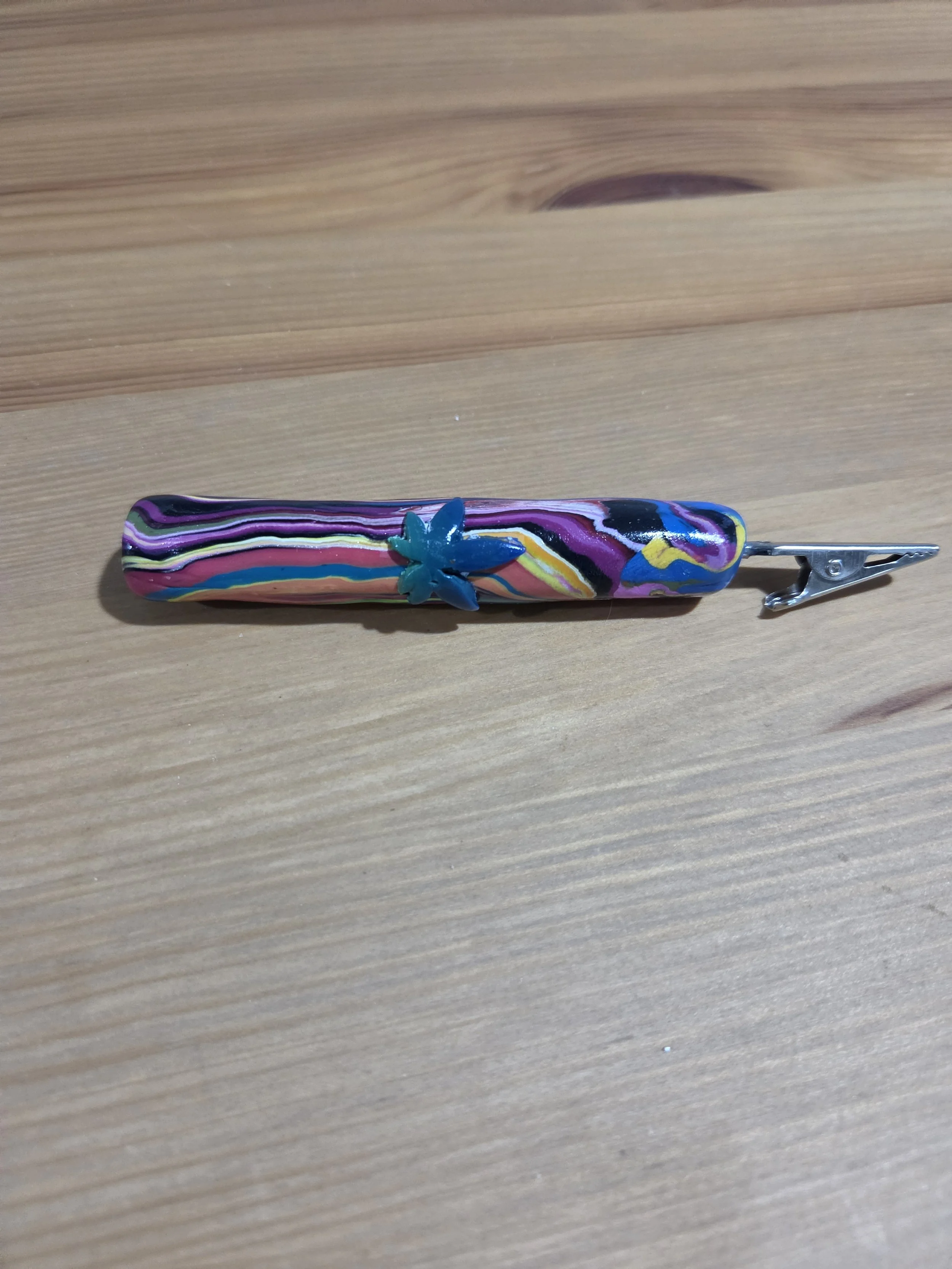 Handcrafted Psychedelic Alligator Clip with Blue Cannabis Leaf