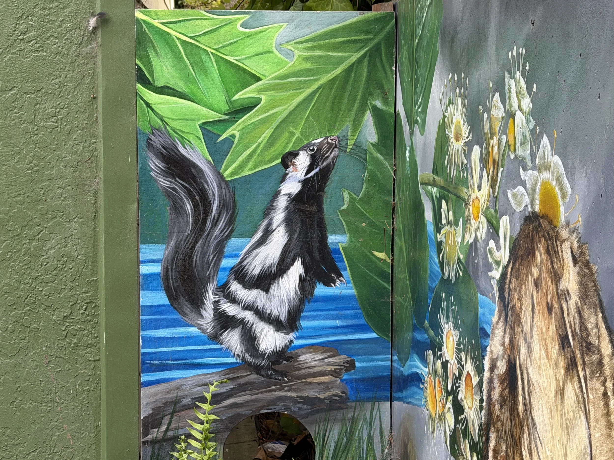 SLIDESHOW-BurnMural-SkunkFlowers.jpeg