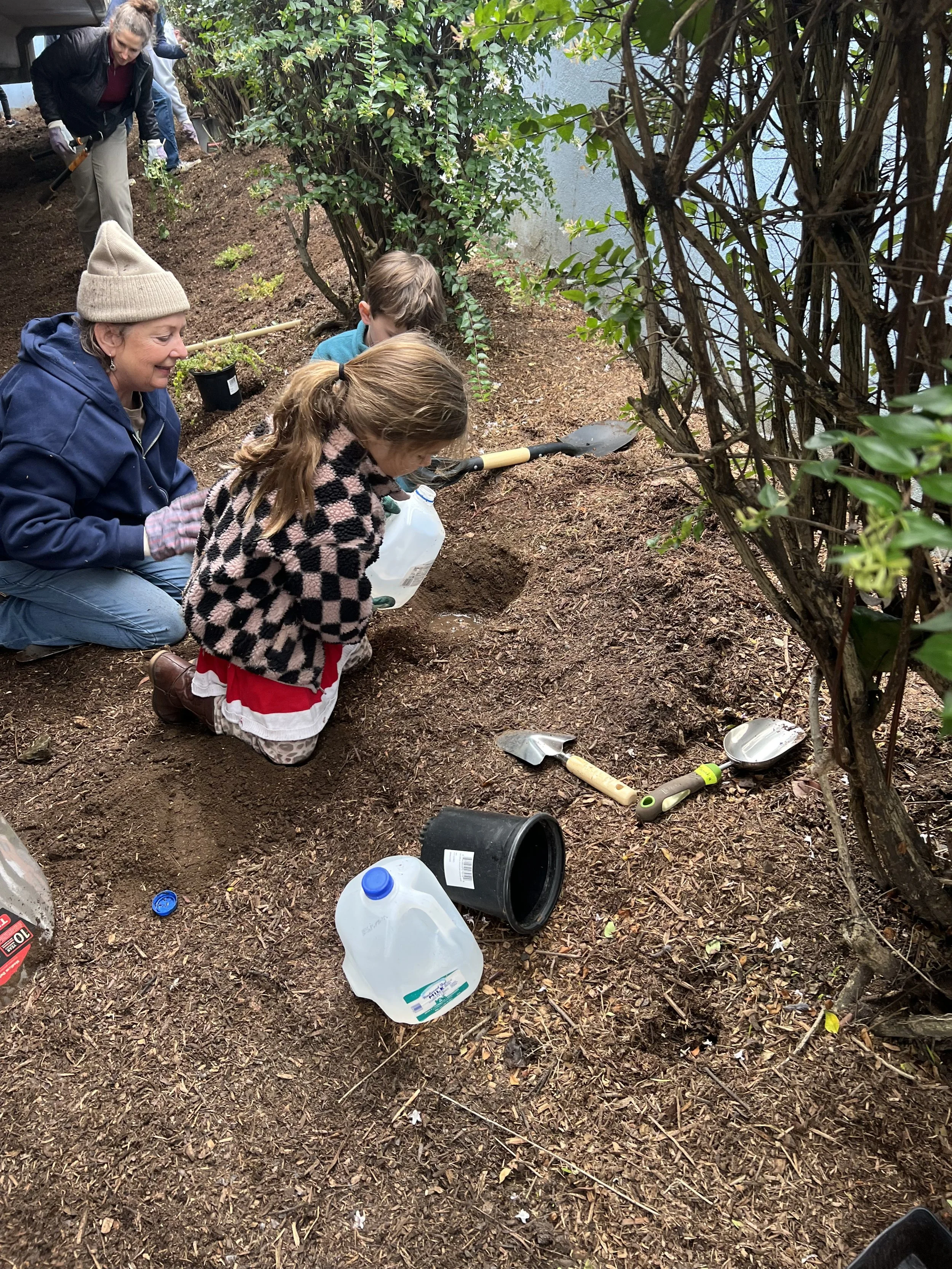 SLIDESHOW-PedBridge-InProgress-GardeningDay.jpg