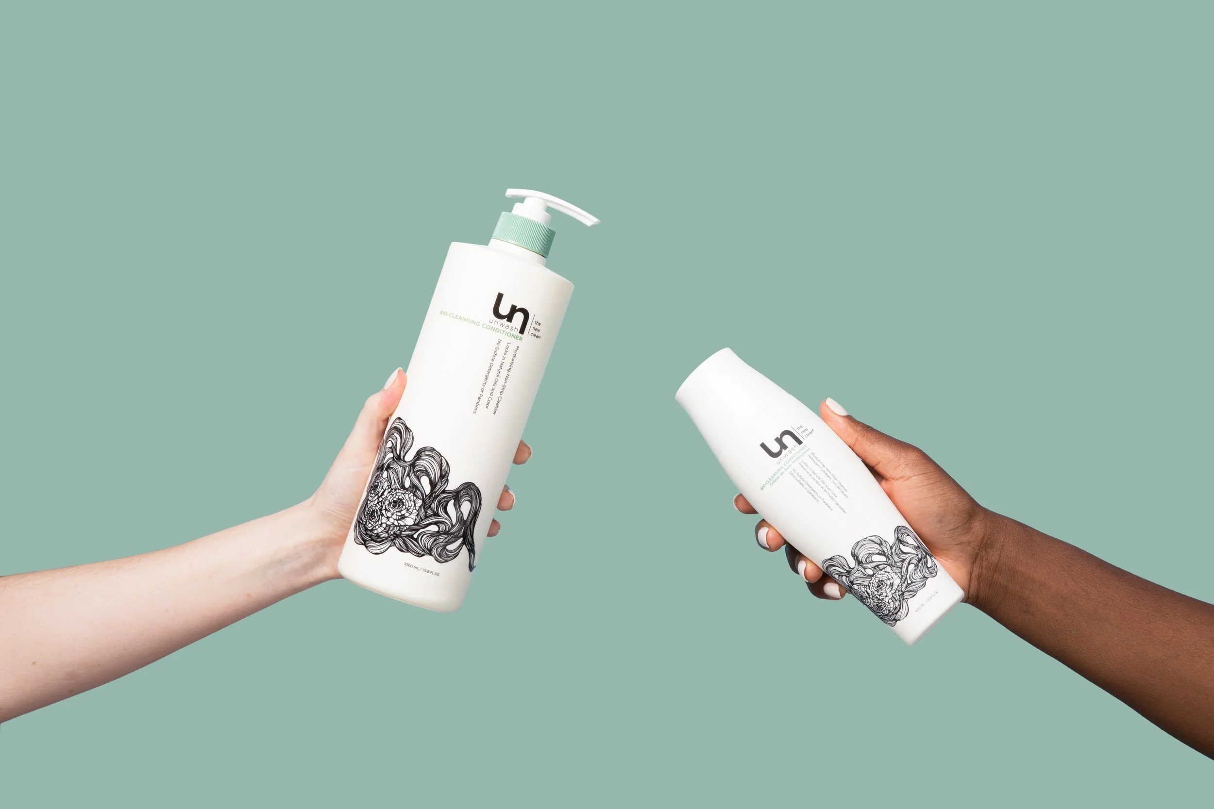 UN_BioCleansingConditioner_13.5oz_33.8oz_GivingHairAHand.jpg