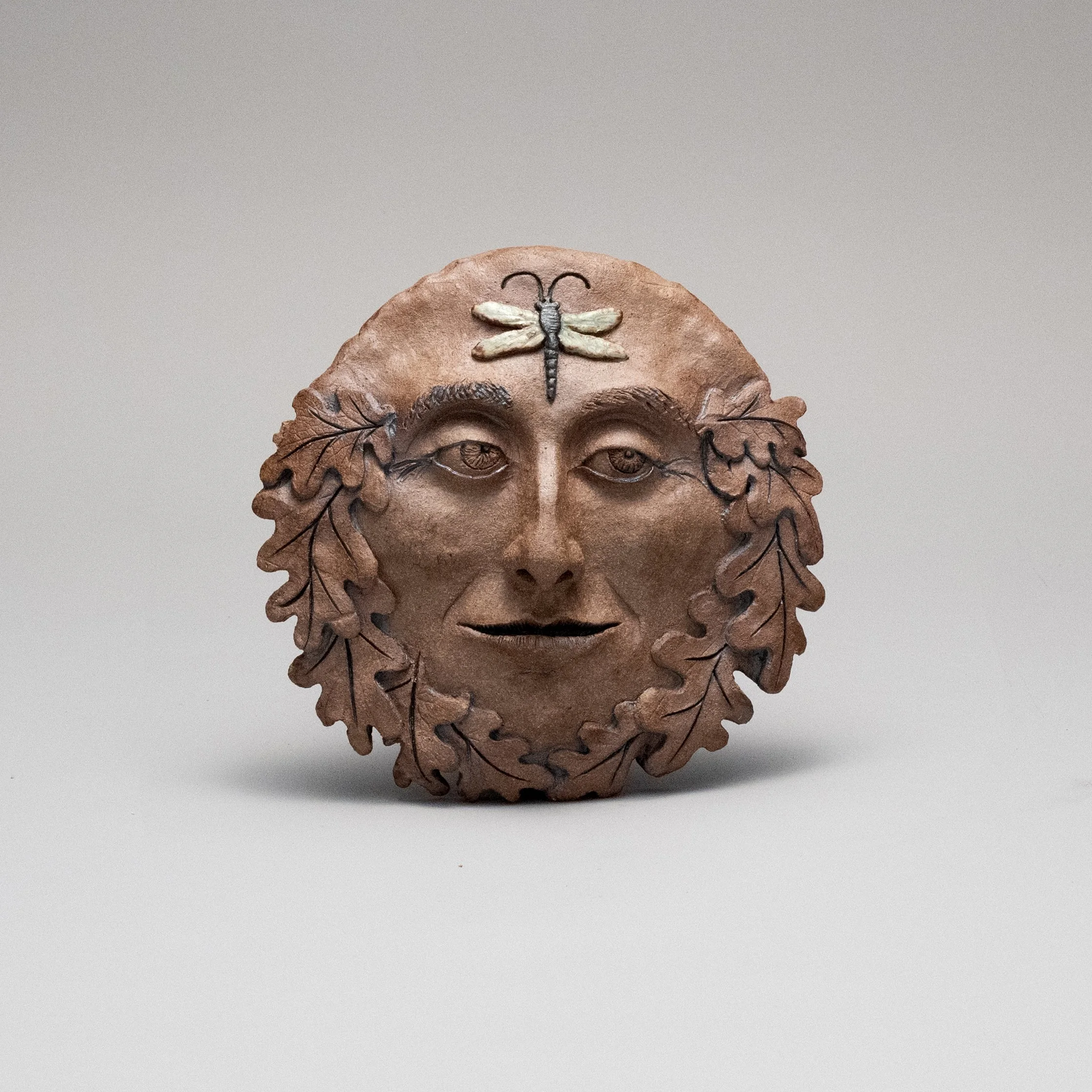 Whimsical Garden Art.  Dragonfly Face Green Man.