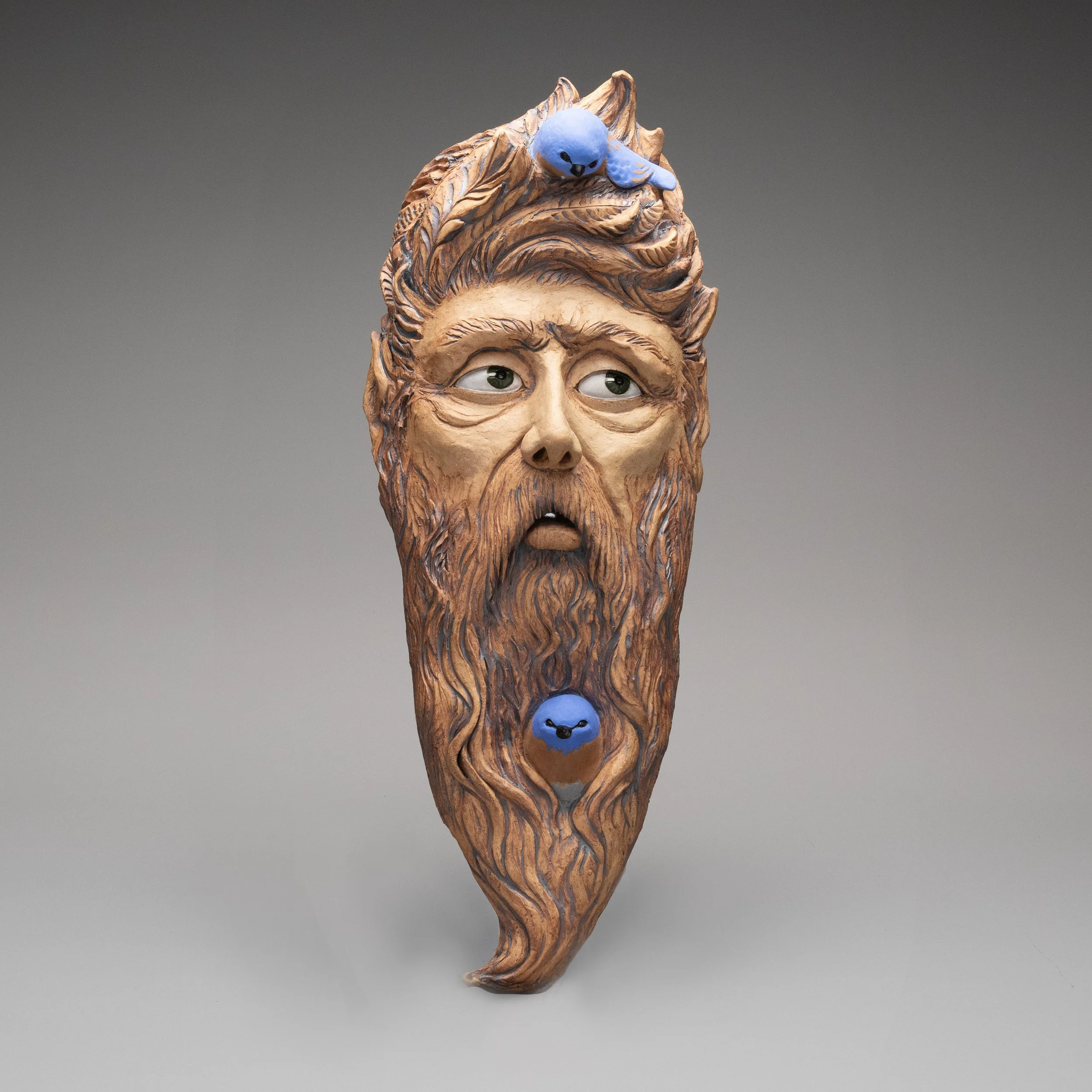 Whimsical Garden Art.  Blue Birds with Bearded Green Man.