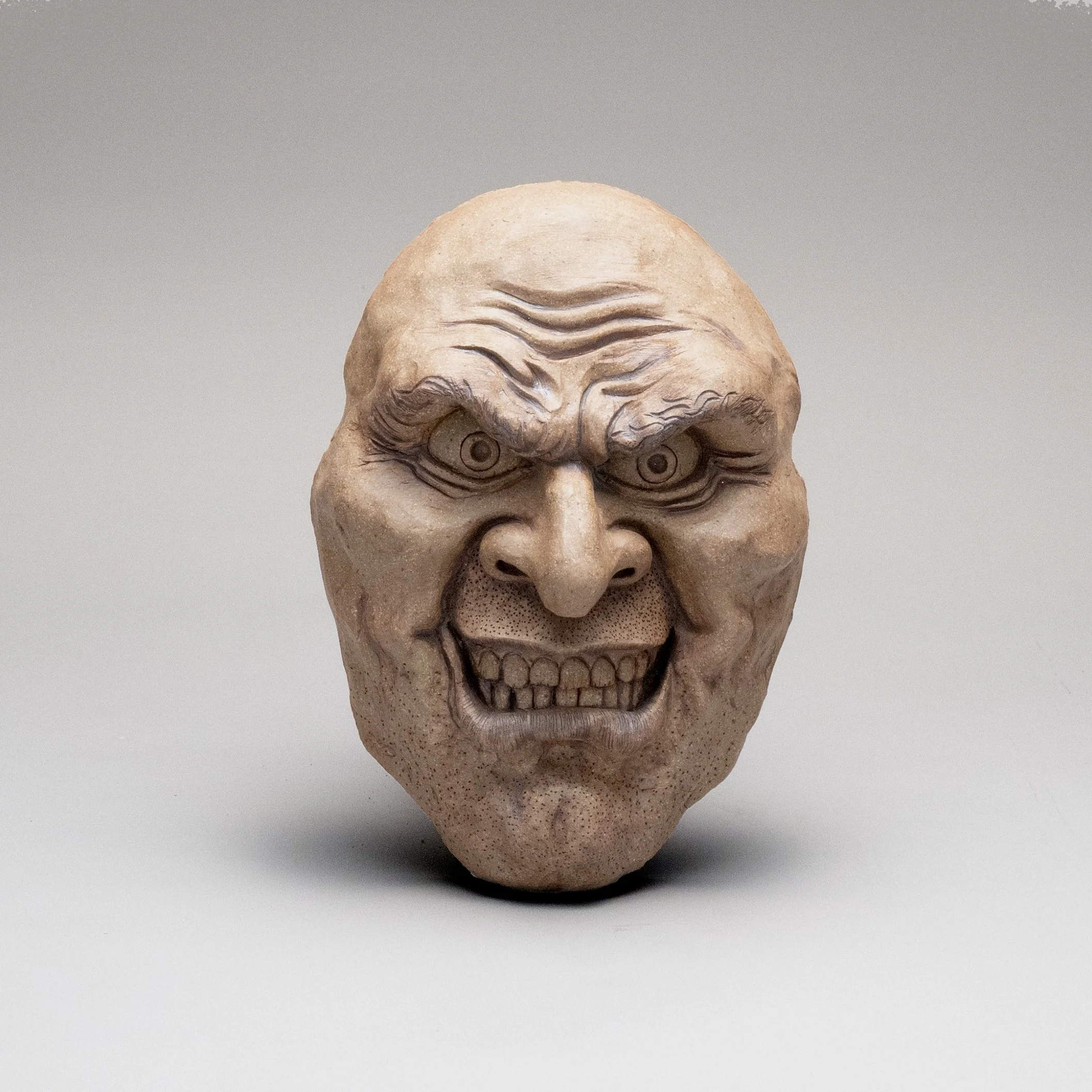 Goofy Garden Art.  Scary Mean Greenman