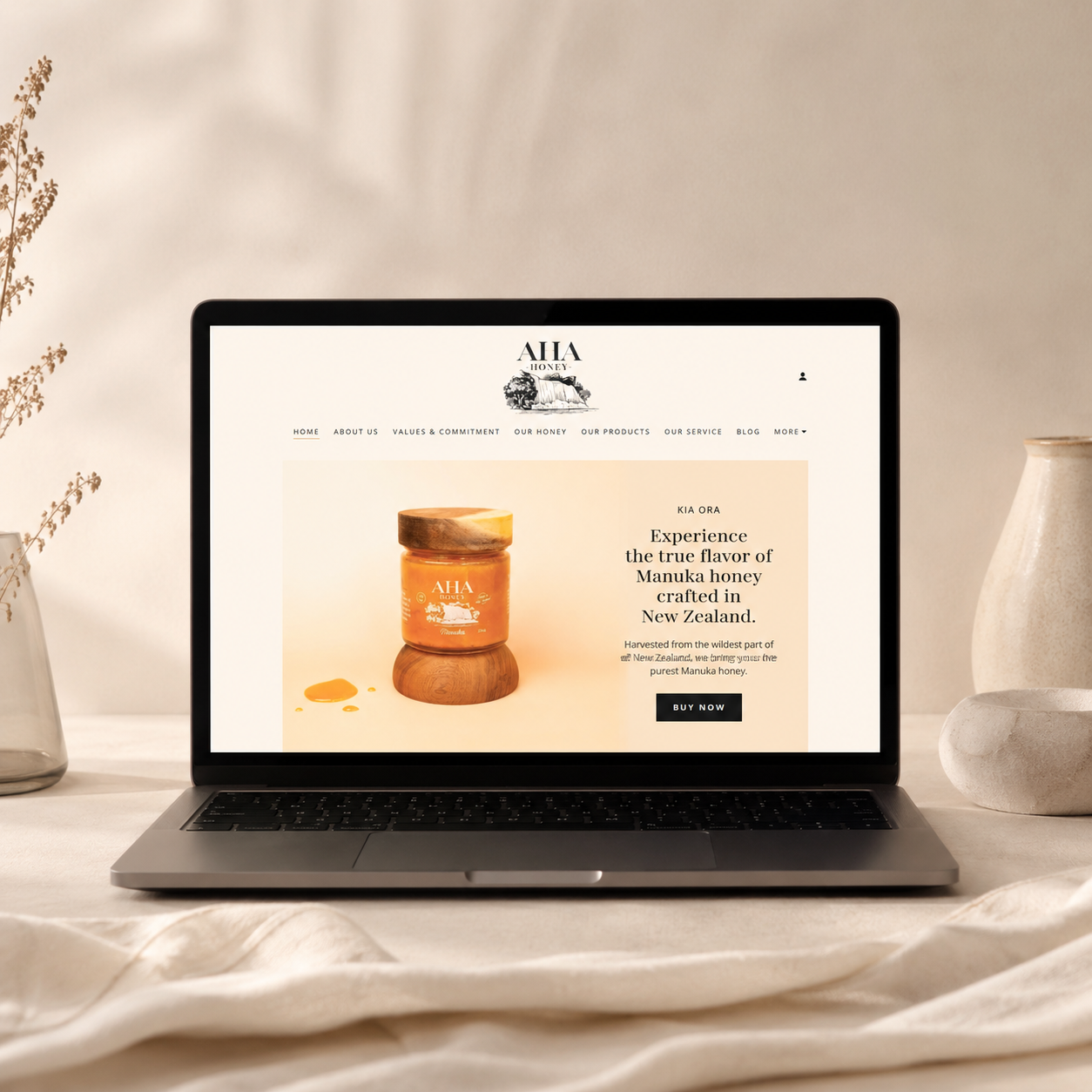 Strategic website design by Aura Studio displayed on a laptop, showcasing a clean and user-friendly website for a Aha Manuka Honey