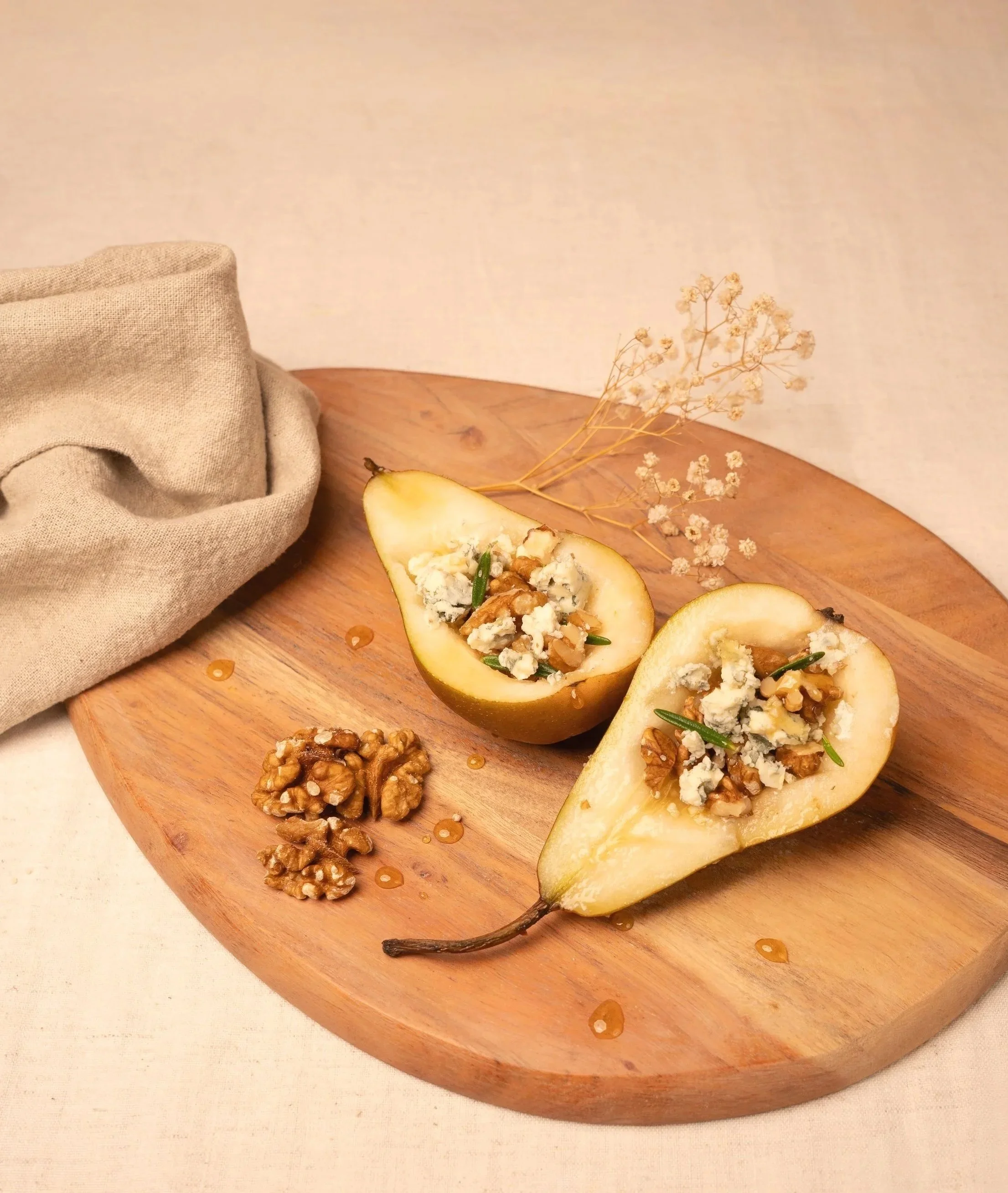 Lifestyle food photography for AHA Honey featuring pears, walnuts and Manuka honey, photographed by Aura Studio in Auckland.