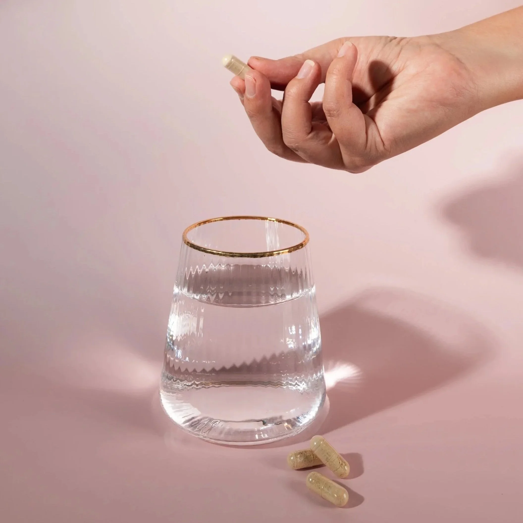 Lifestyle product photography showcasing wellness supplements, created by Aura Studio for health and wellness brands.