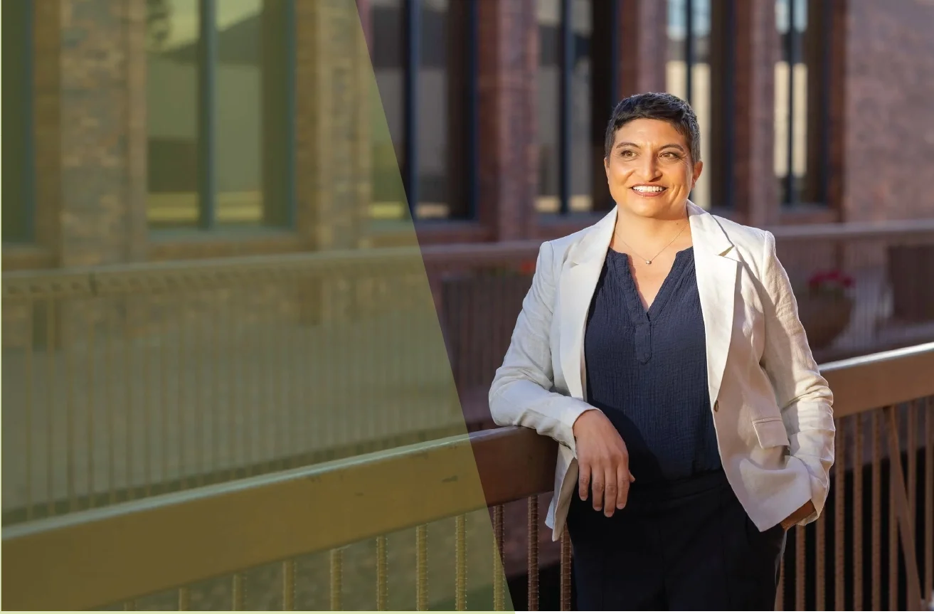 Janelle Carman-Wagner (JCW) standing in front of Mill Creek in downtown Walla Walla.