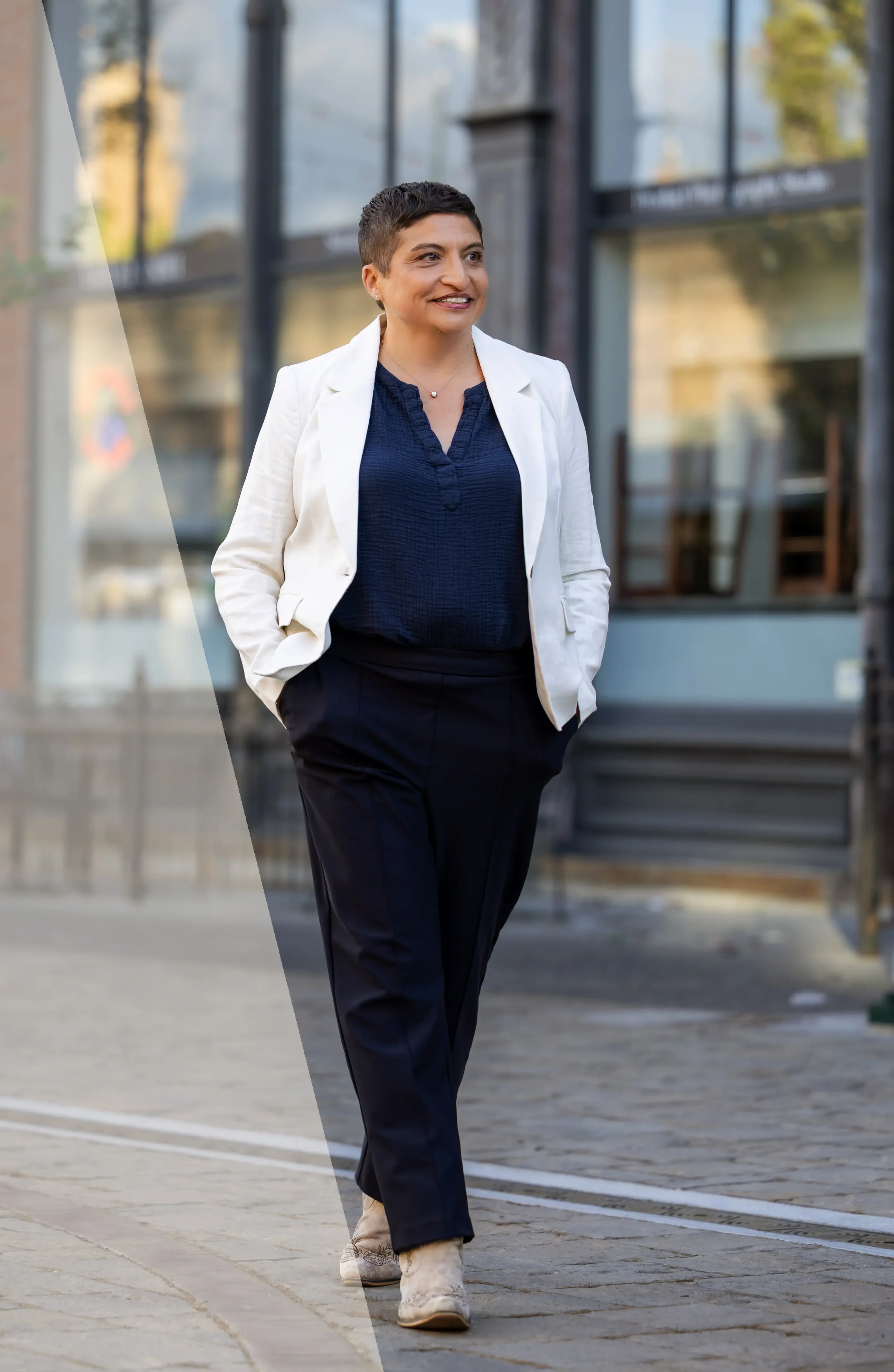 Janelle Carman-Wagner (JCW) walking on the plaza in downtown Walla Walla