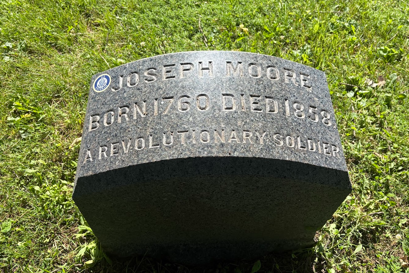 Gravestone for Joseph Moore, born in 1760, died in 1858, marking him as a revolutionary soldier.
