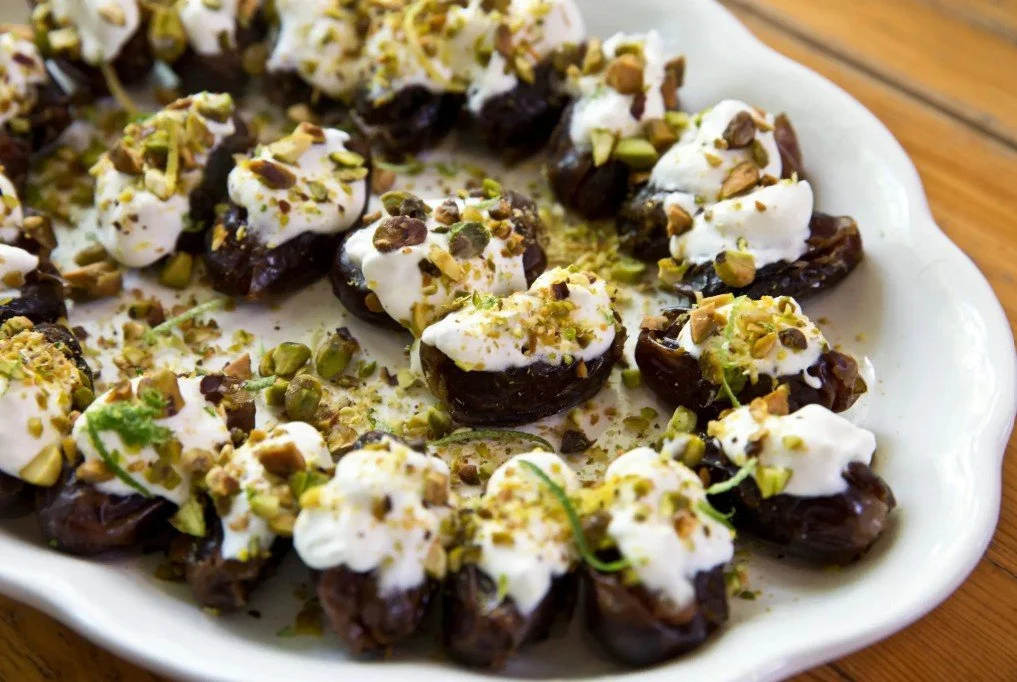 Dates with cream and chopped pistachios featured in Yvonne Maffei’s Ramadan recipe for The New York Times Cooking.