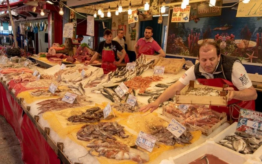 Traditional Mediterranean fish market illustrating food culture, trade, and culinary diplomacy.