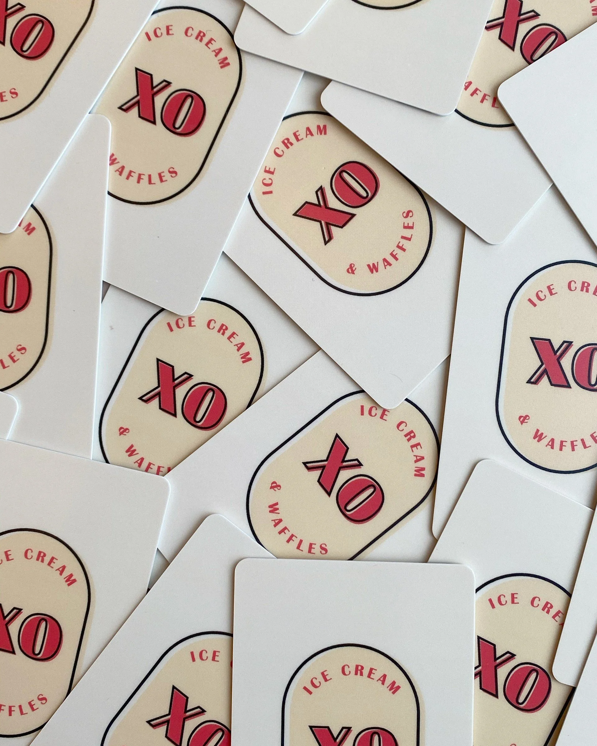 Many XO gift cards laid out