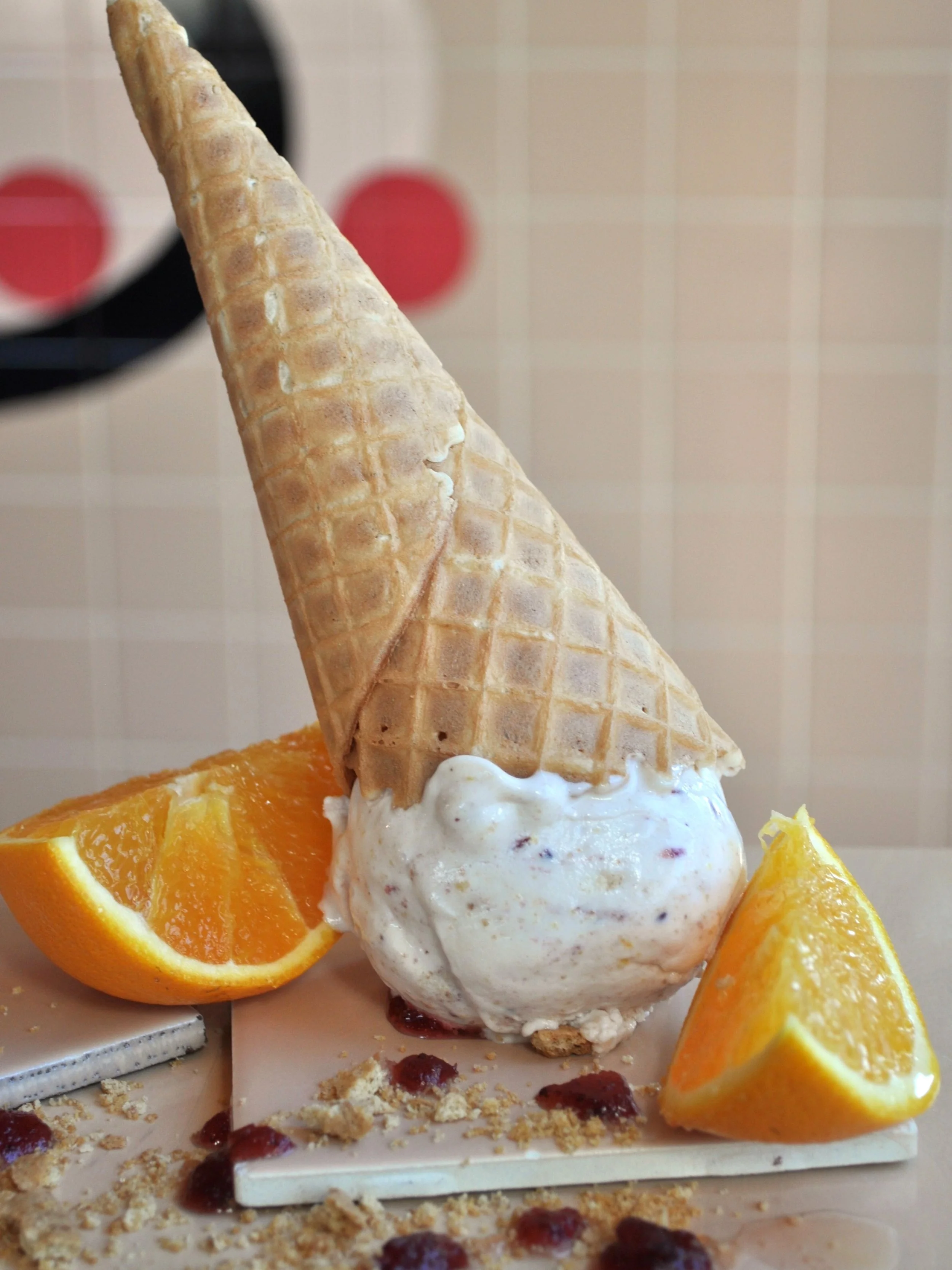 Upside down scoop of Cranberry Jam Orange Zest Cheesecake ice cream
