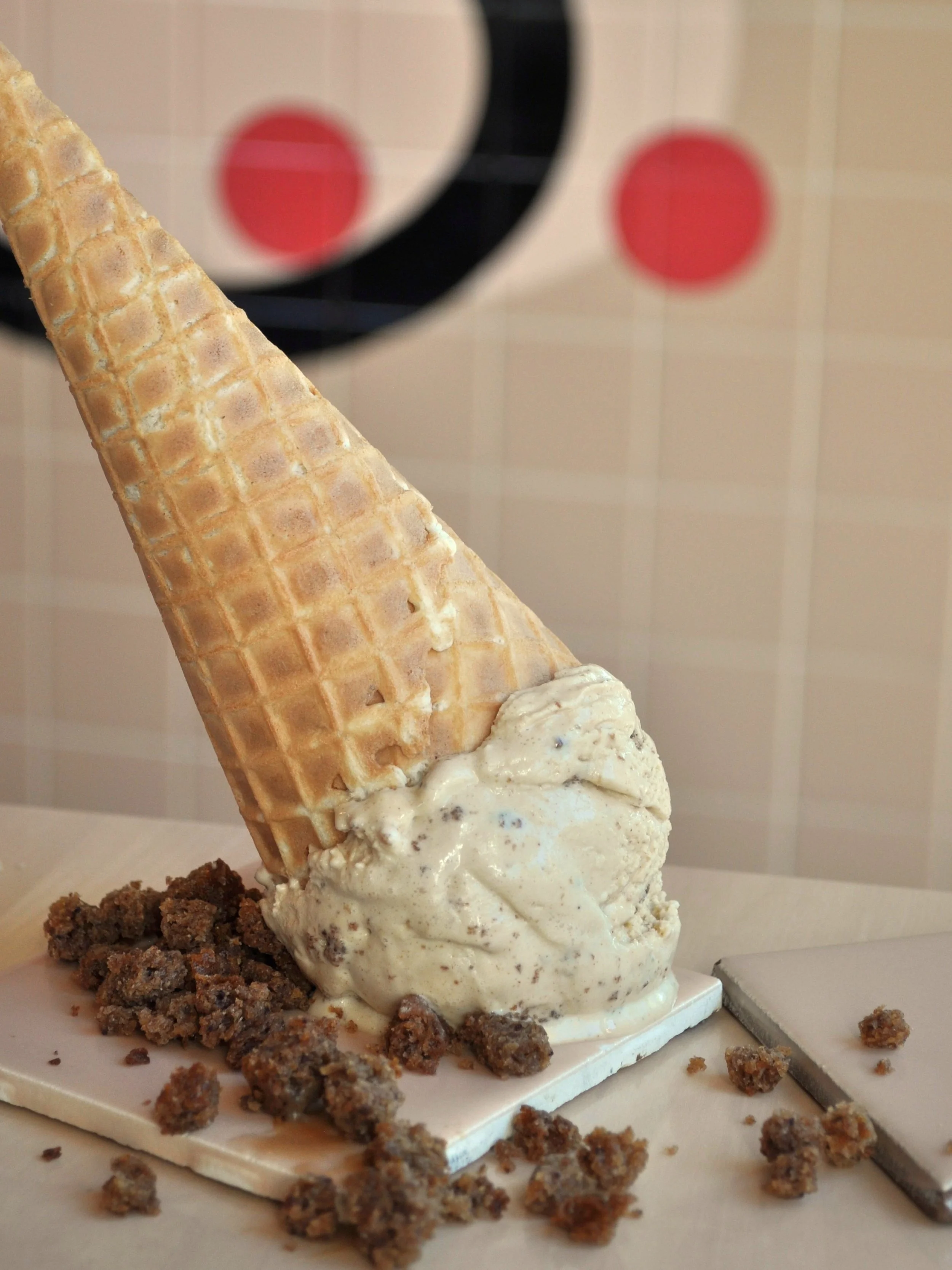 Upside down scoop of Sticky Toffee Pudding ice cream