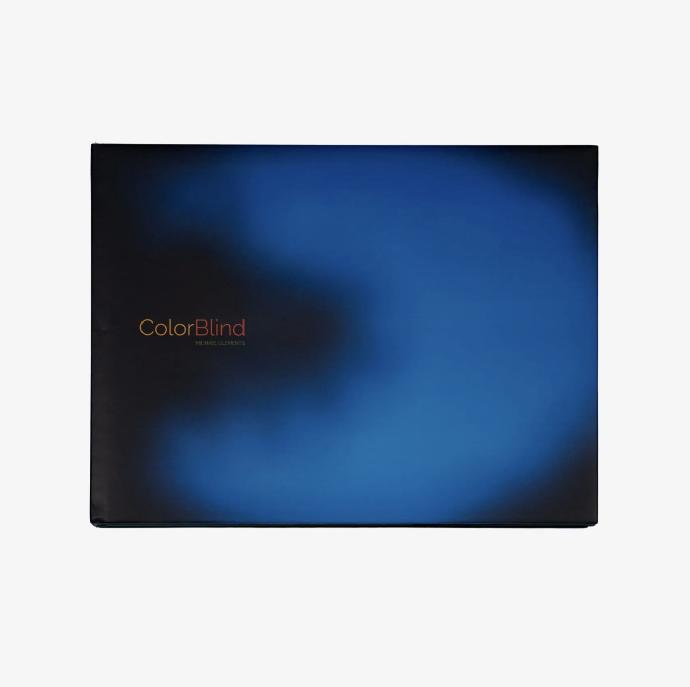 A book cover titled 'Color Blind' by Michael Clements with a dark blue gradient background.