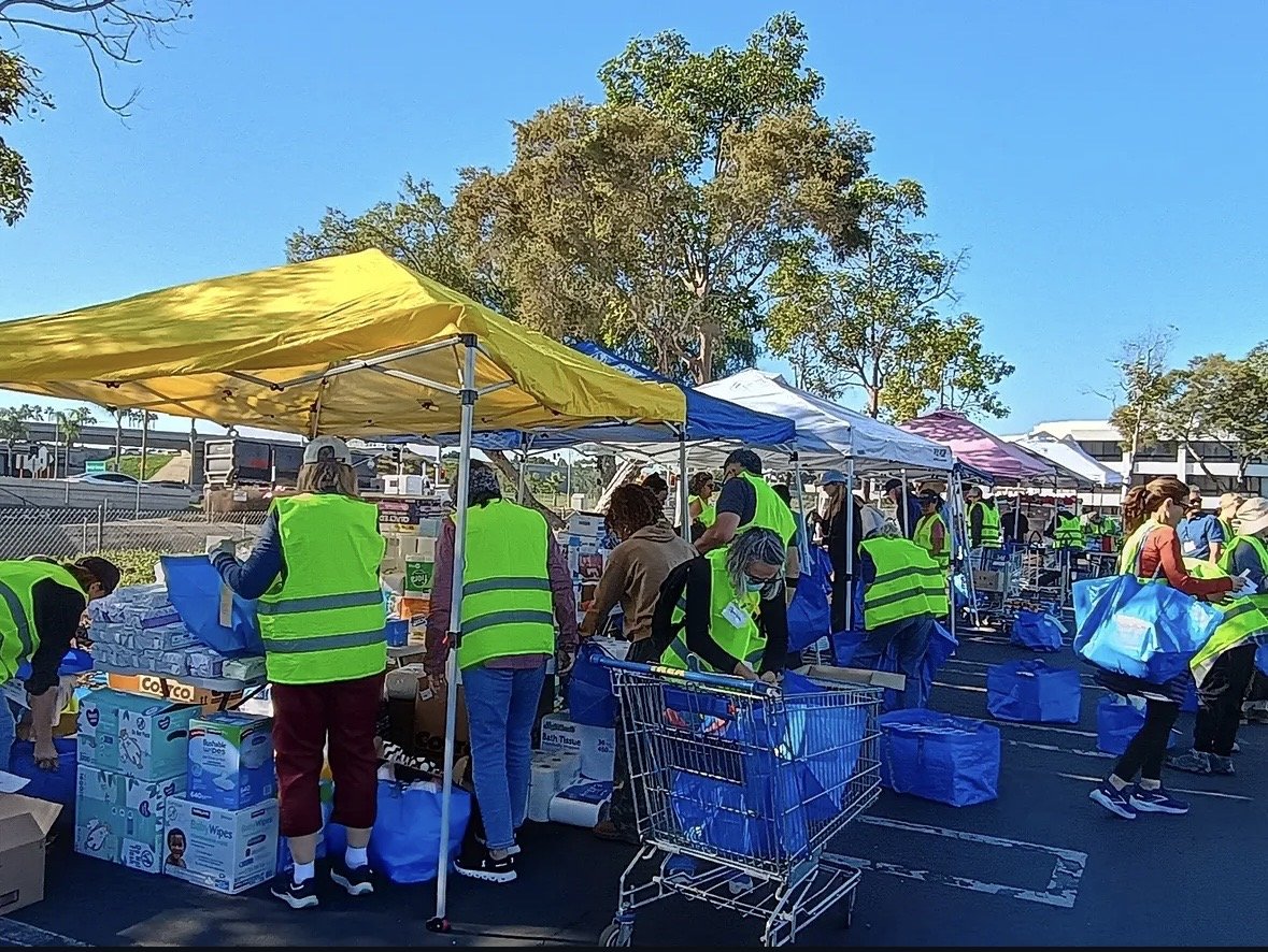 People packing donations