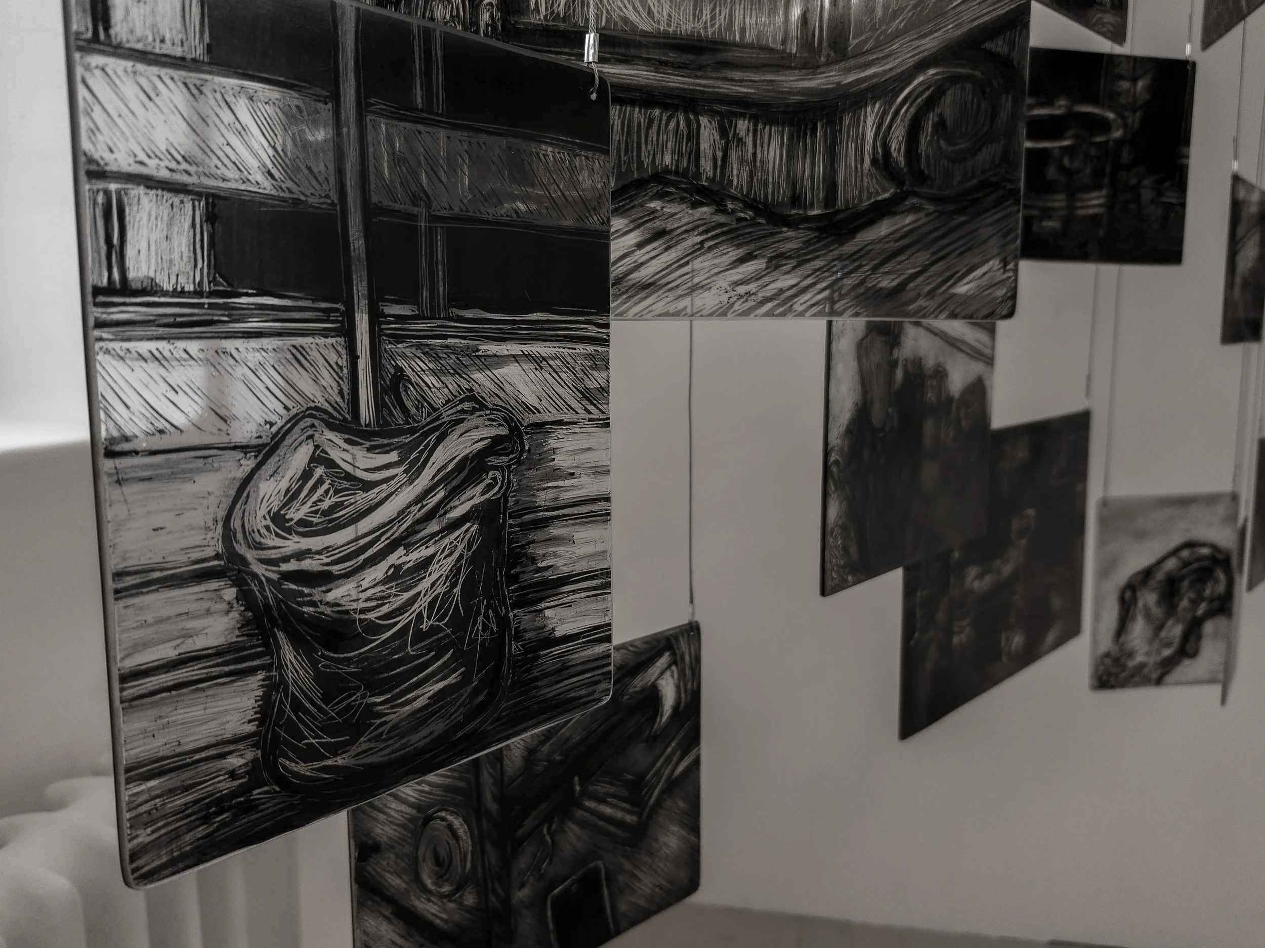 Close up of my memory mobile exhibited during second hand smoke, Trace black sgraffito and painting on horticultural glass