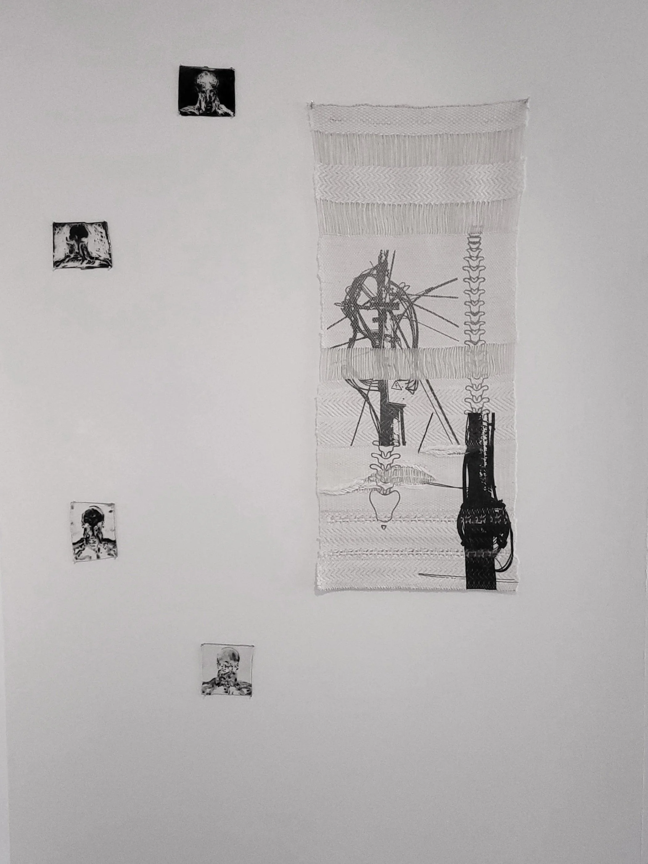 Close up of "Autonomous Vessel," consisting of two large sublimation printed  polyacrylic weave/cotton warp tapestries and seven  small pieces of glass