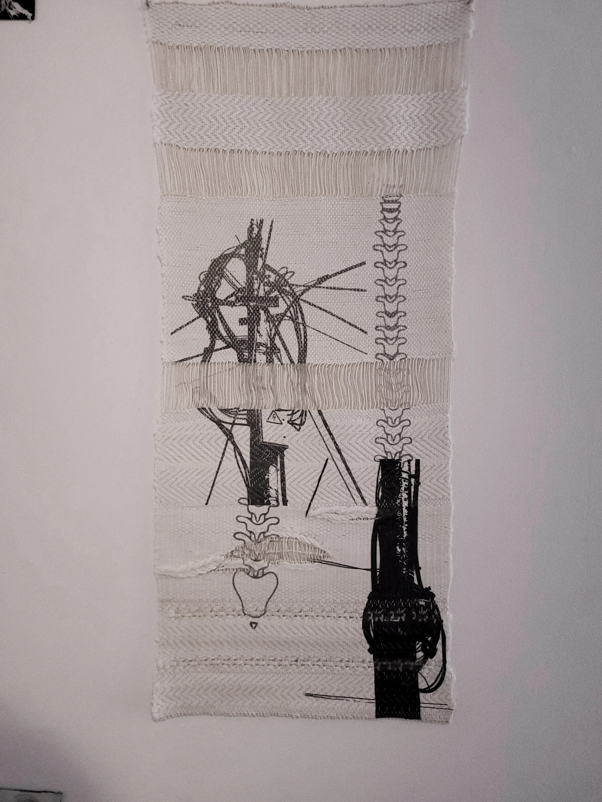 Close up of "Autonomous Vessel," consisting of two large sublimation printed  polyacrylic weave/cotton warp tapestries and seven  small pieces of glass