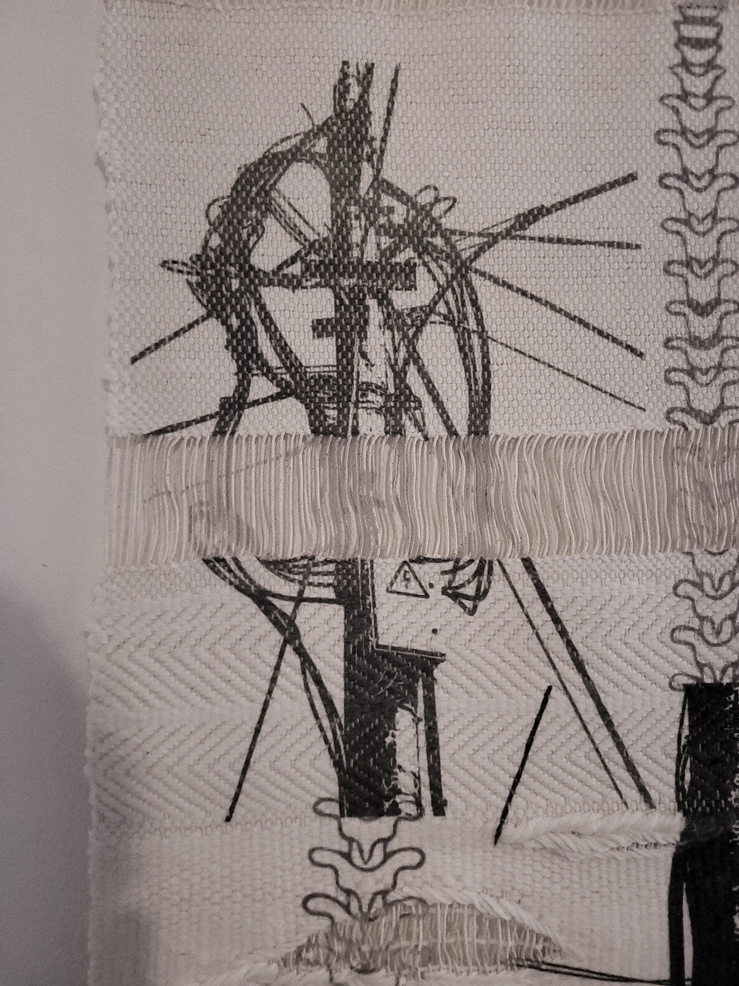 Close up of "Autonomous Vessel," consisting of two large sublimation printed  polyacrylic weave/cotton warp tapestries and seven  small pieces of glass