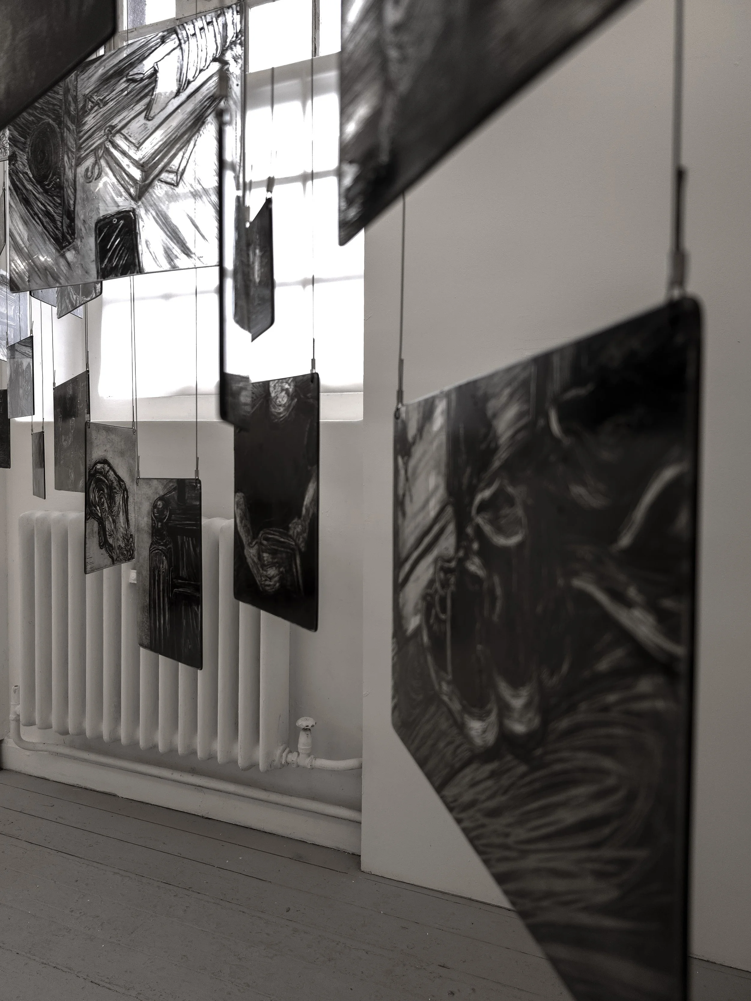 Close up of my memory mobile exhibited during second hand smoke, Trace black sgraffito and painting on horticultural glass