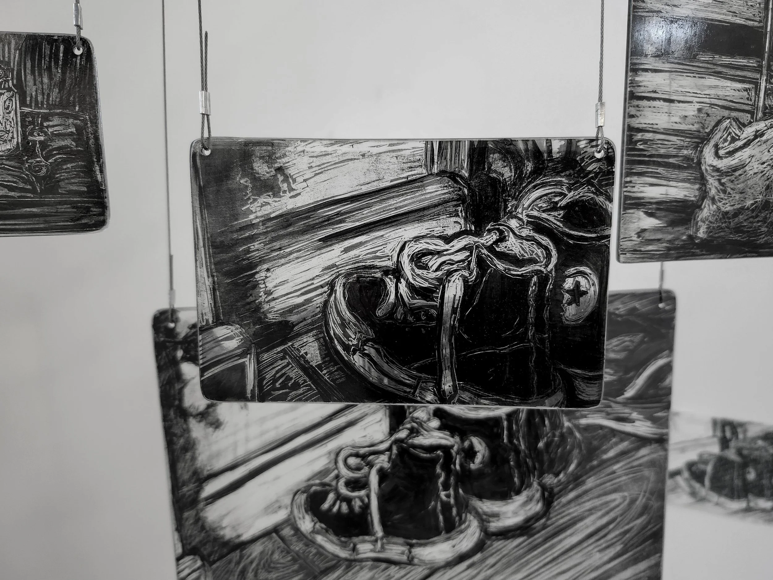 Close up of my memory mobile exhibited during second hand smoke, Trace black sgraffito and painting on horticultural glass