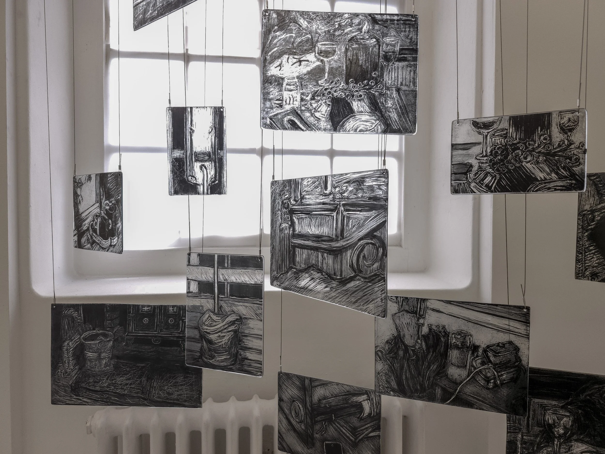 Close up of my memory mobile exhibited during second hand smoke, Trace black sgraffito and painting on horticultural glass