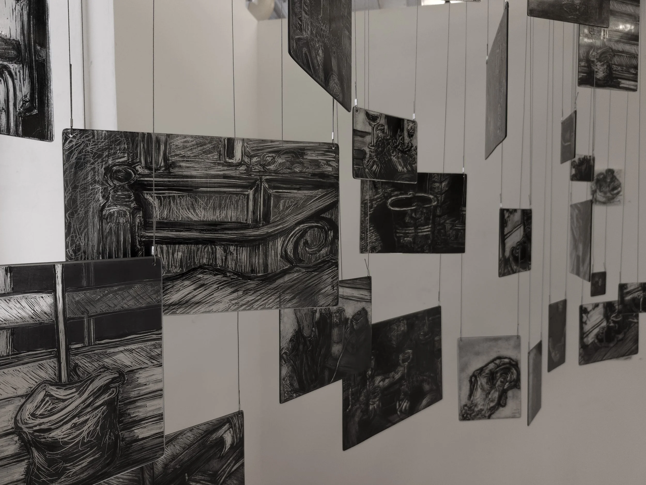 Close up of my memory mobile exhibited during second hand smoke, Trace black sgraffito and painting on horticultural glass