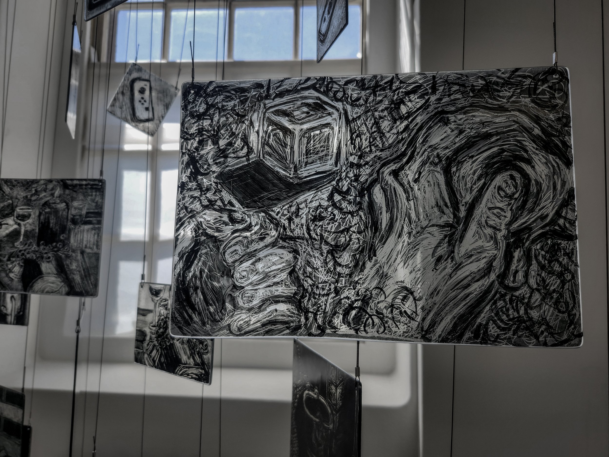 "Fidget Study," 2026, Sgrafitto and glass painting on horticultural glass