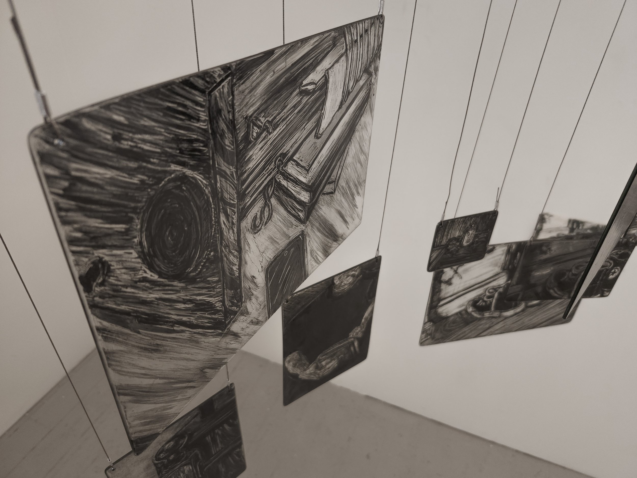 Close up of my memory mobile exhibited during second hand smoke, Trace black sgraffito and painting on horticultural glass