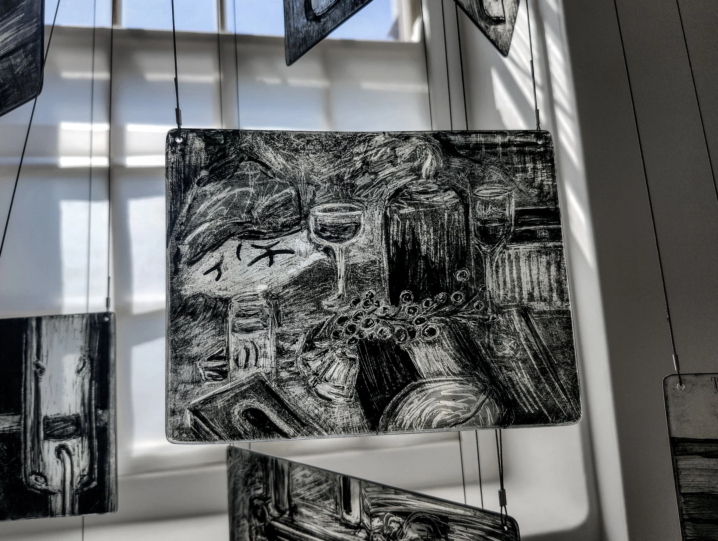 "Merriment," 2026, Sgrafitto and glass painting on horticultural glass
