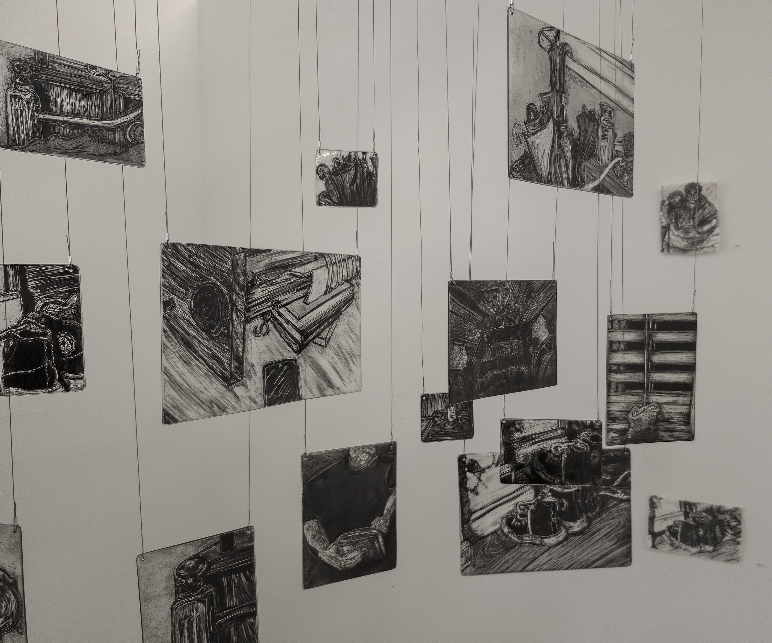 Close up of my memory mobile exhibited during second hand smoke, Trace black sgraffito and painting on horticultural glass