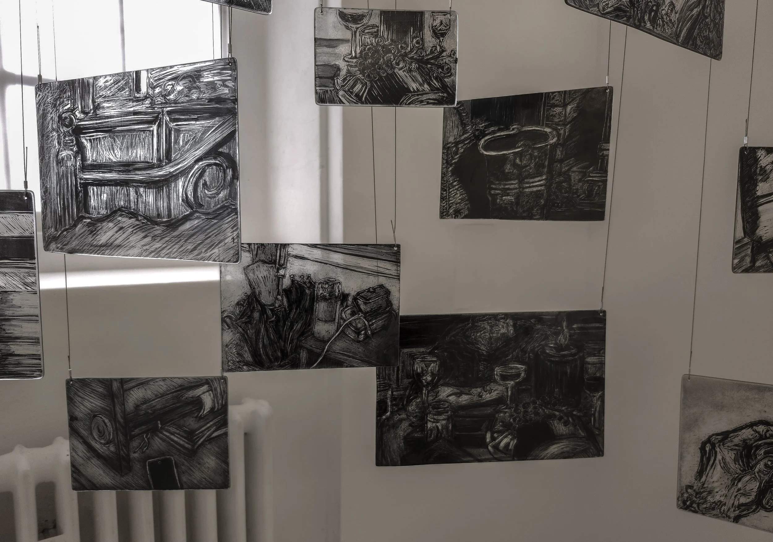 Close up of my memory mobile exhibited during second hand smoke, Trace black sgraffito and painting on horticultural glass