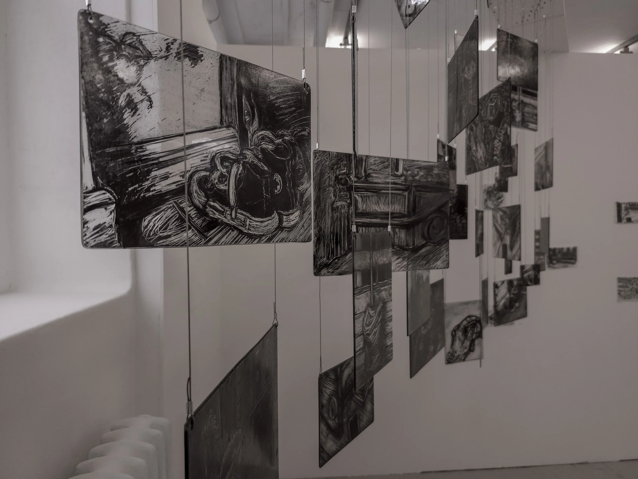 Close up of my memory mobile exhibited during second hand smoke, Trace black sgraffito and painting on horticultural glass