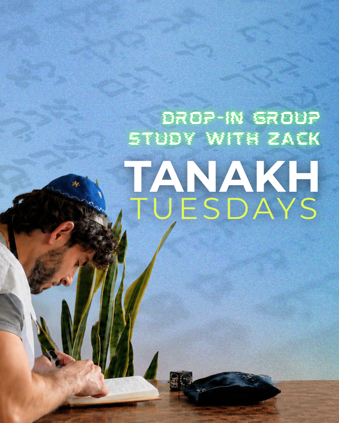 A person wearing a blue kippah studying a book at a table with a black bag and a small black cube. The background features a light blue wall with green and white text promoting a drop-in study group called Tanakh Tuesdays.