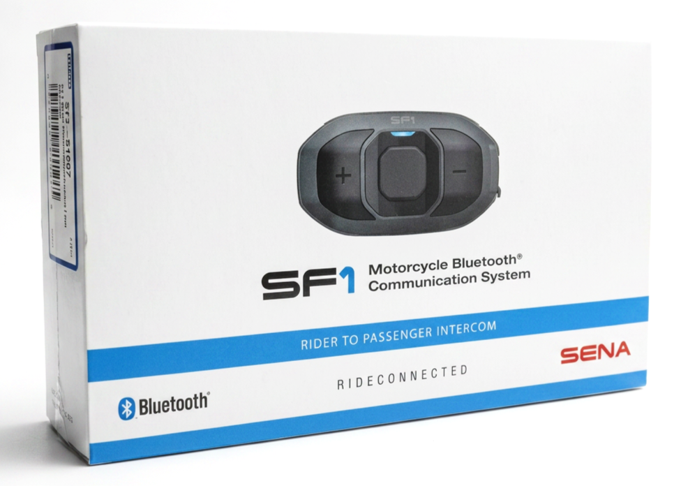 Sena SF1 rider-to-passenger Bluetooth communication system in retail packaging on a white studio background.