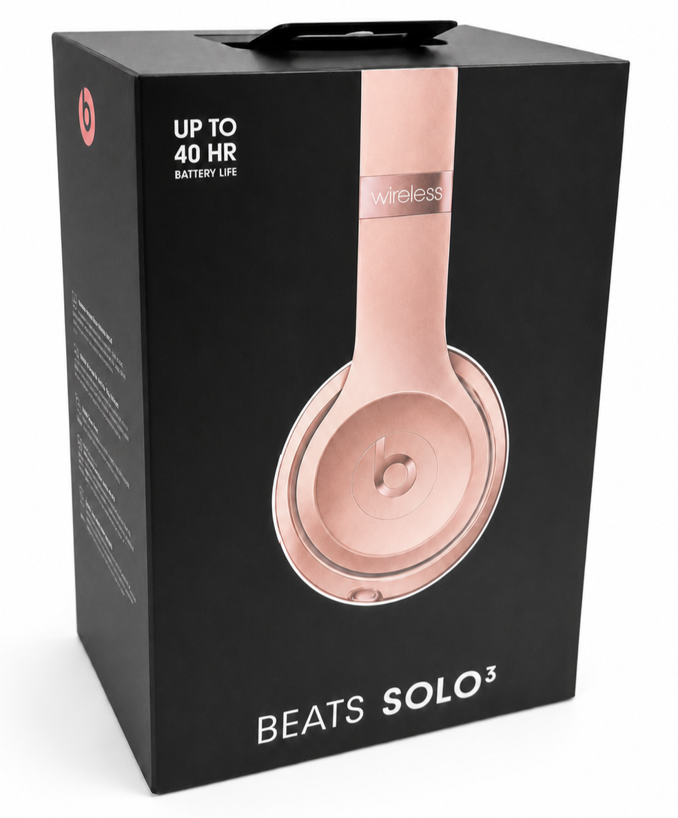 Beats Solo3 wireless headphones in rose gold retail packaging on a white studio background.