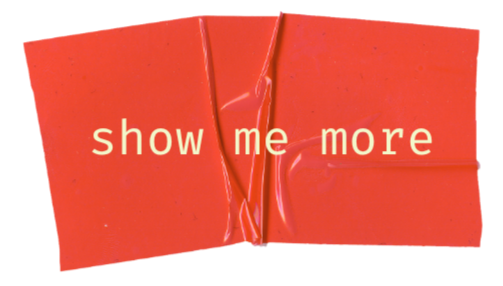red button with the words show me more
