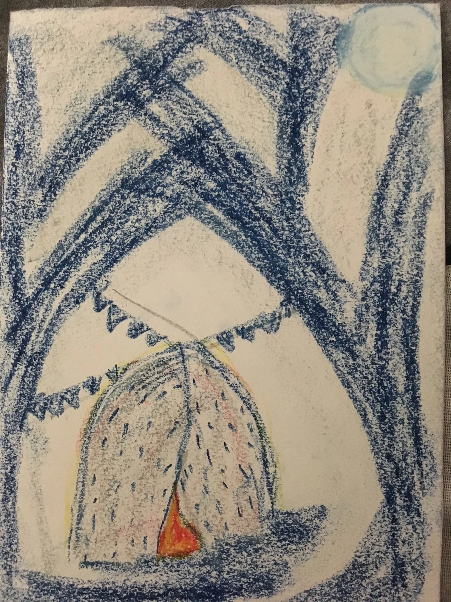 Blue crayon drawing of a tent under tree branches, warm glow inside tent.