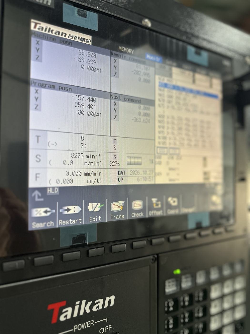 Mitsubishi CNC control screen on a Taikan T-V856S running a program