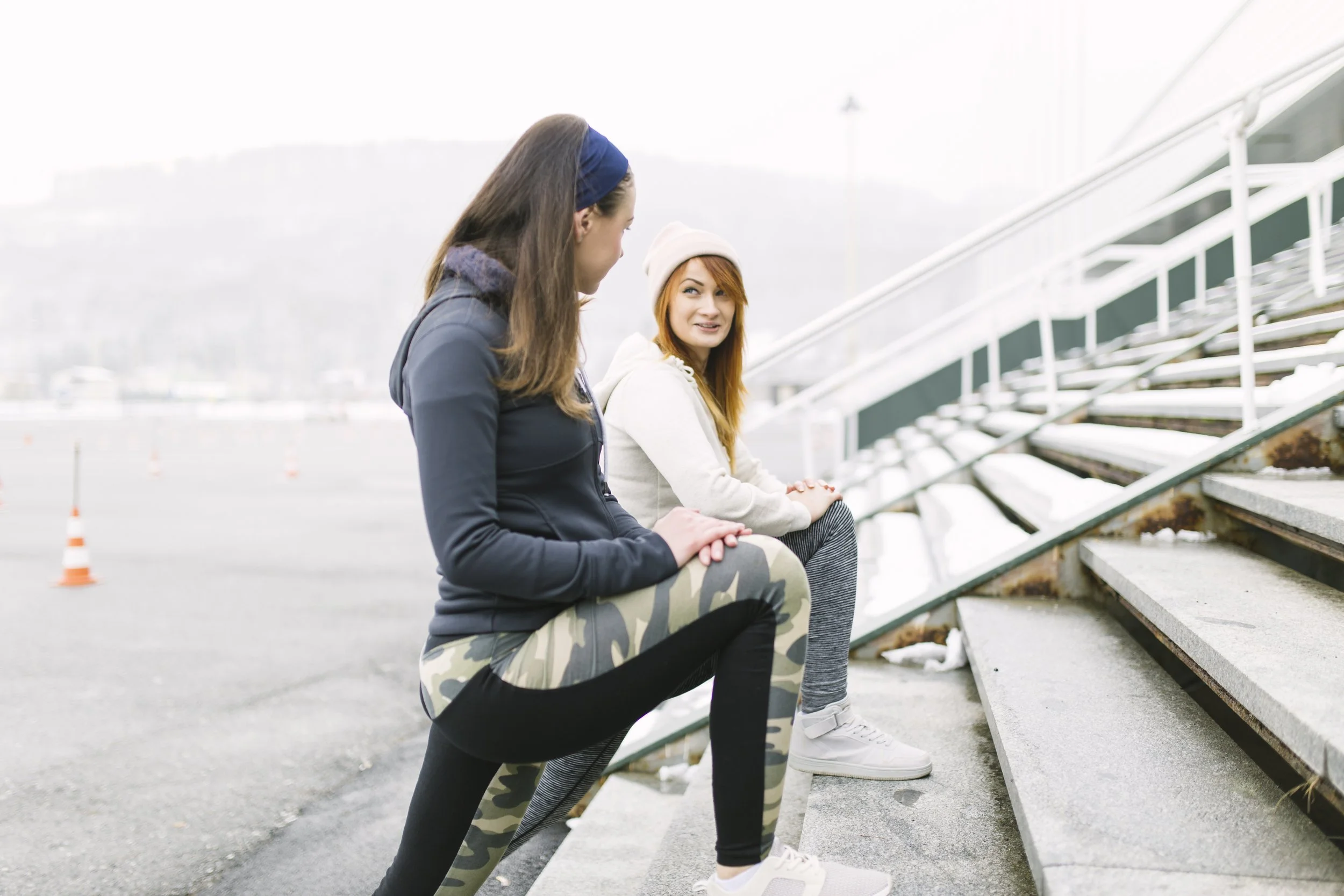 women-exercising-speaking-stairs.jpg