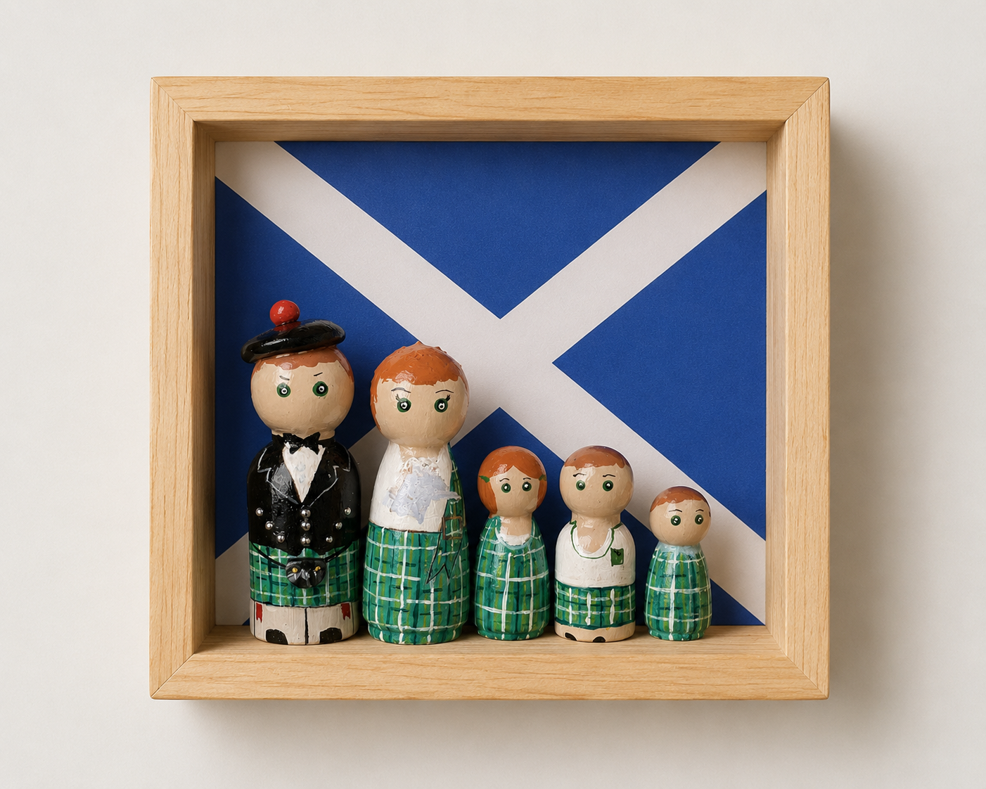 Scottish Peg Doll family in a frame