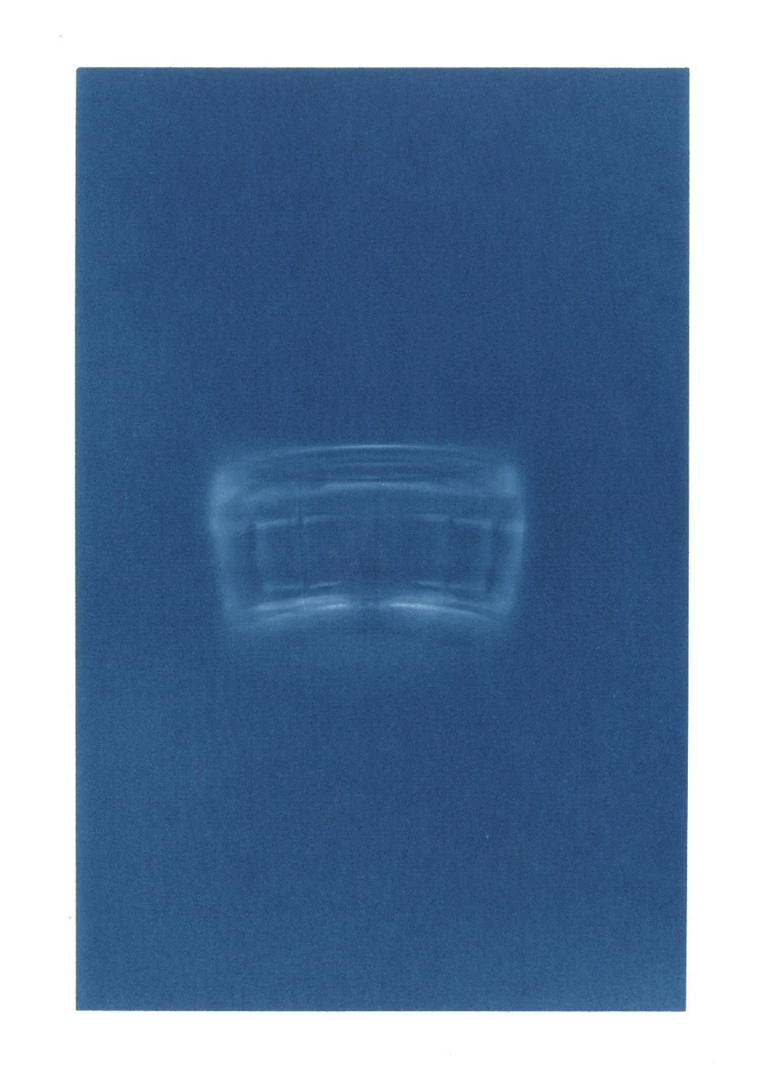 Blue foam board with a clear plastic grab bar attached in the center.