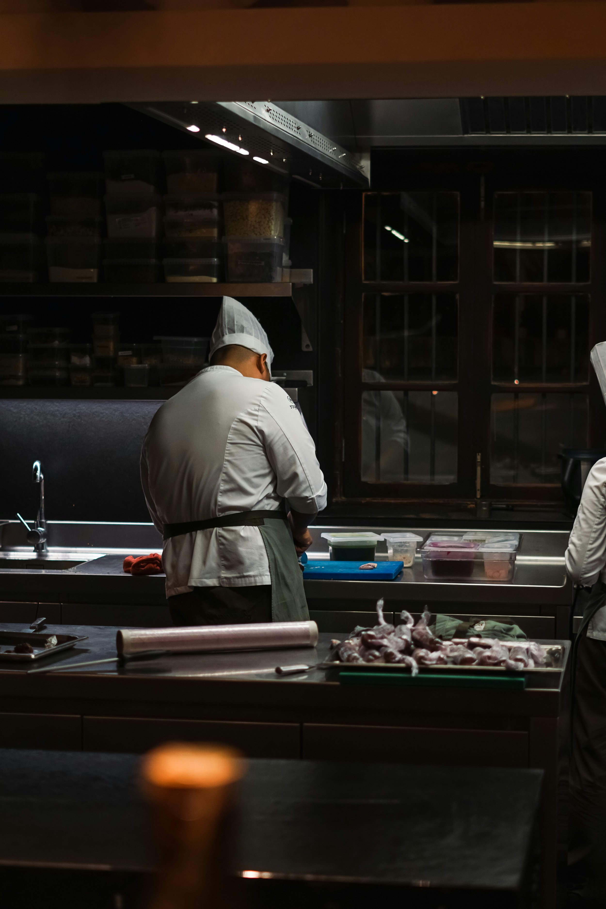 A chef carrying out fish preperations